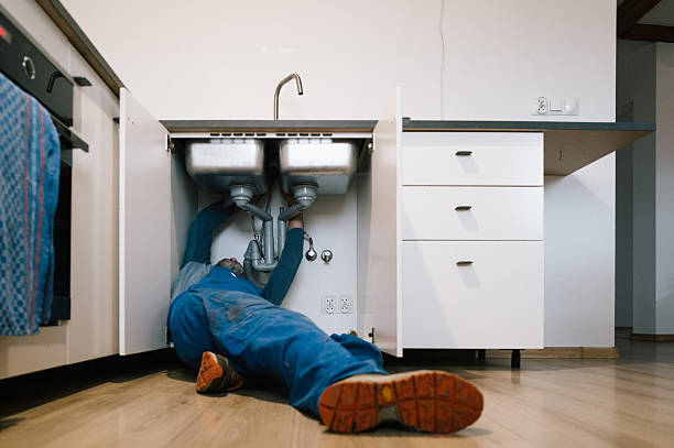 Professional Emergency Plumber technician working in Edwards, MS